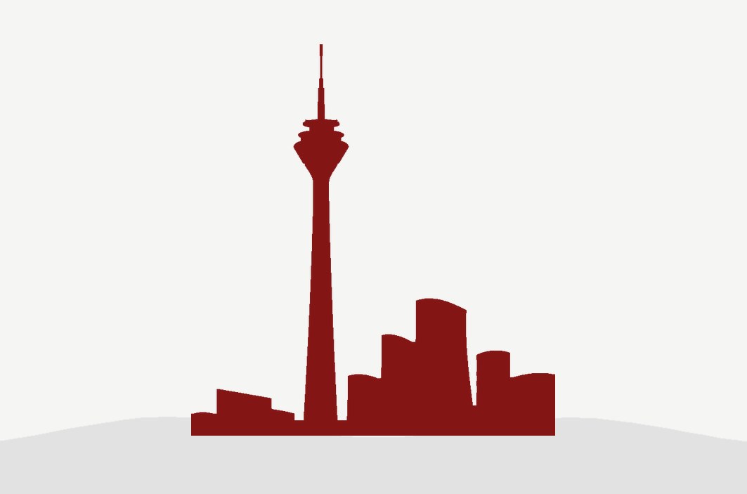 Soft Skills Seminare in Düsseldorf: Rheinturm als Silhouette in Modulrot